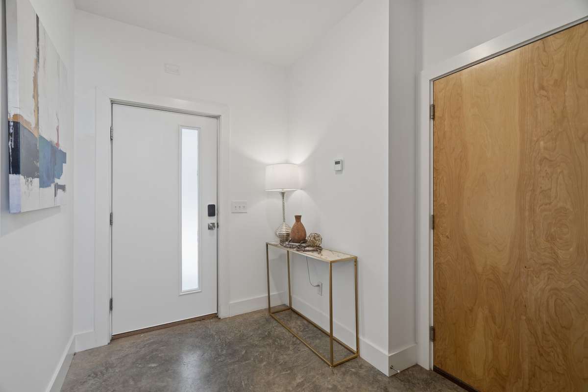 Welcoming entry way entrance from front door or garage