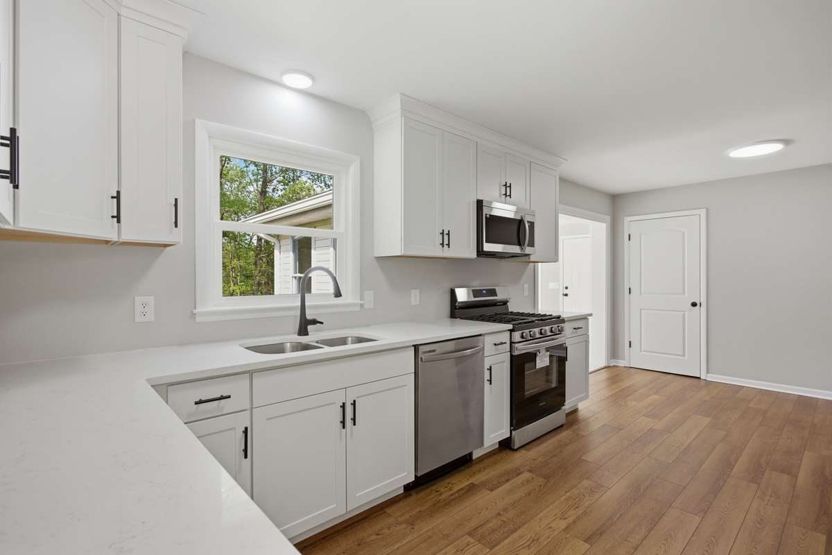 New cabinets and quartz countertops. Kitchen pantry