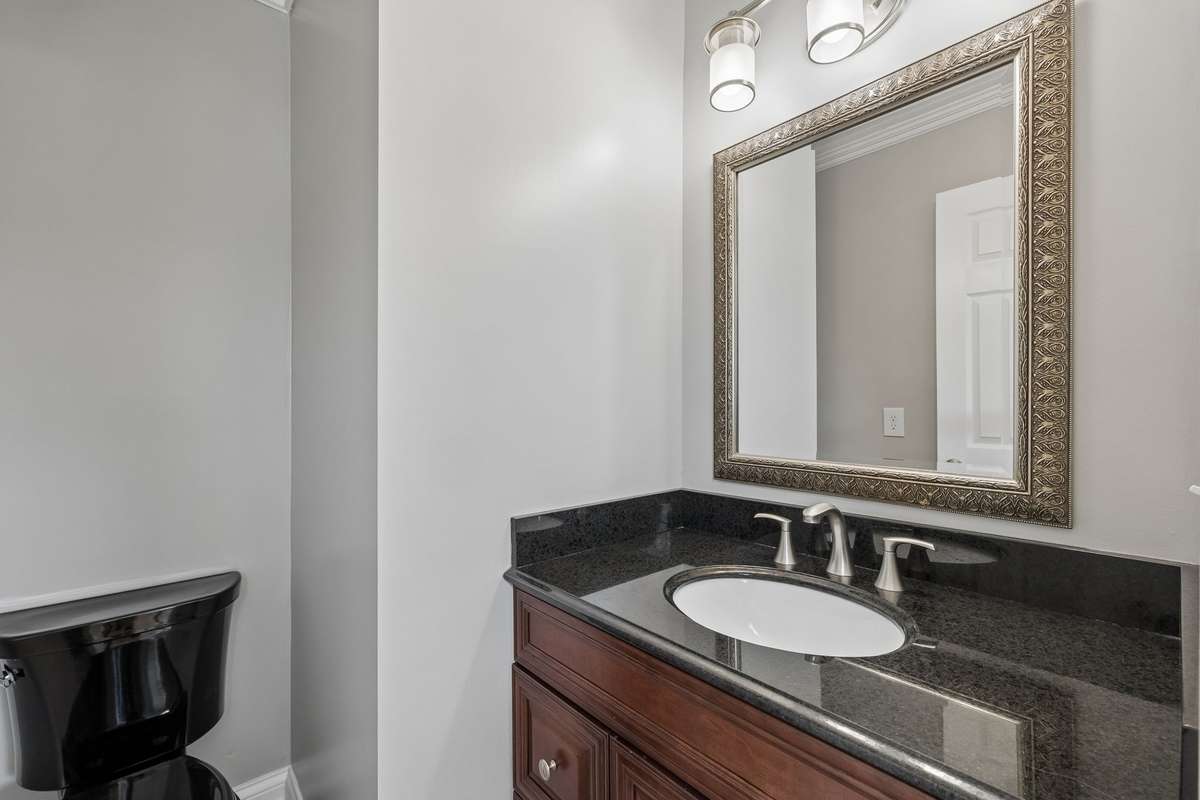 Half bath in bedroom off dining room