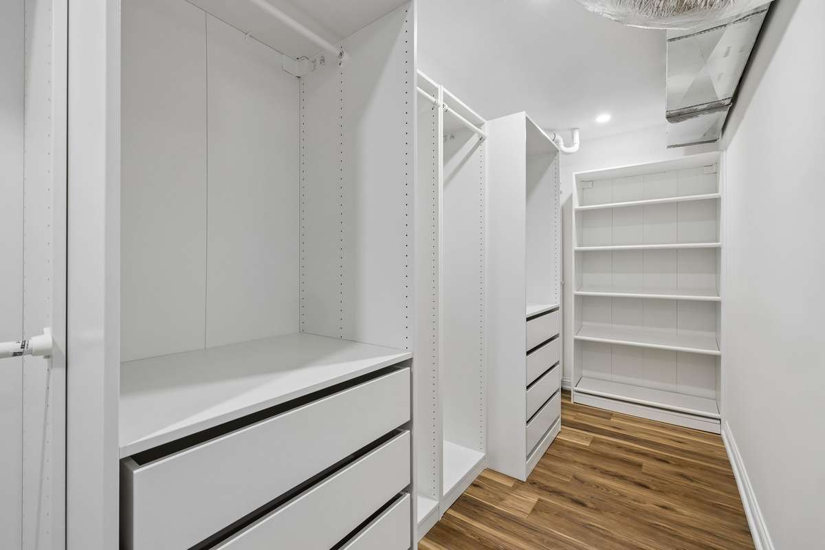 Basement bedroom walk in closet was thoughtfully planned