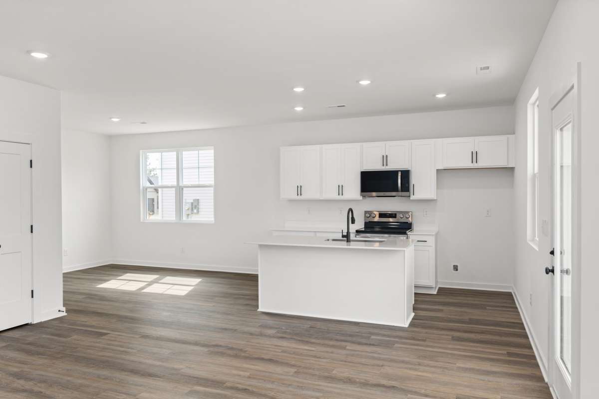 You will LOVE this 1st floor, with easy to maintain Luxury Vinyl flooring, open floorplan and GREAT natural light!