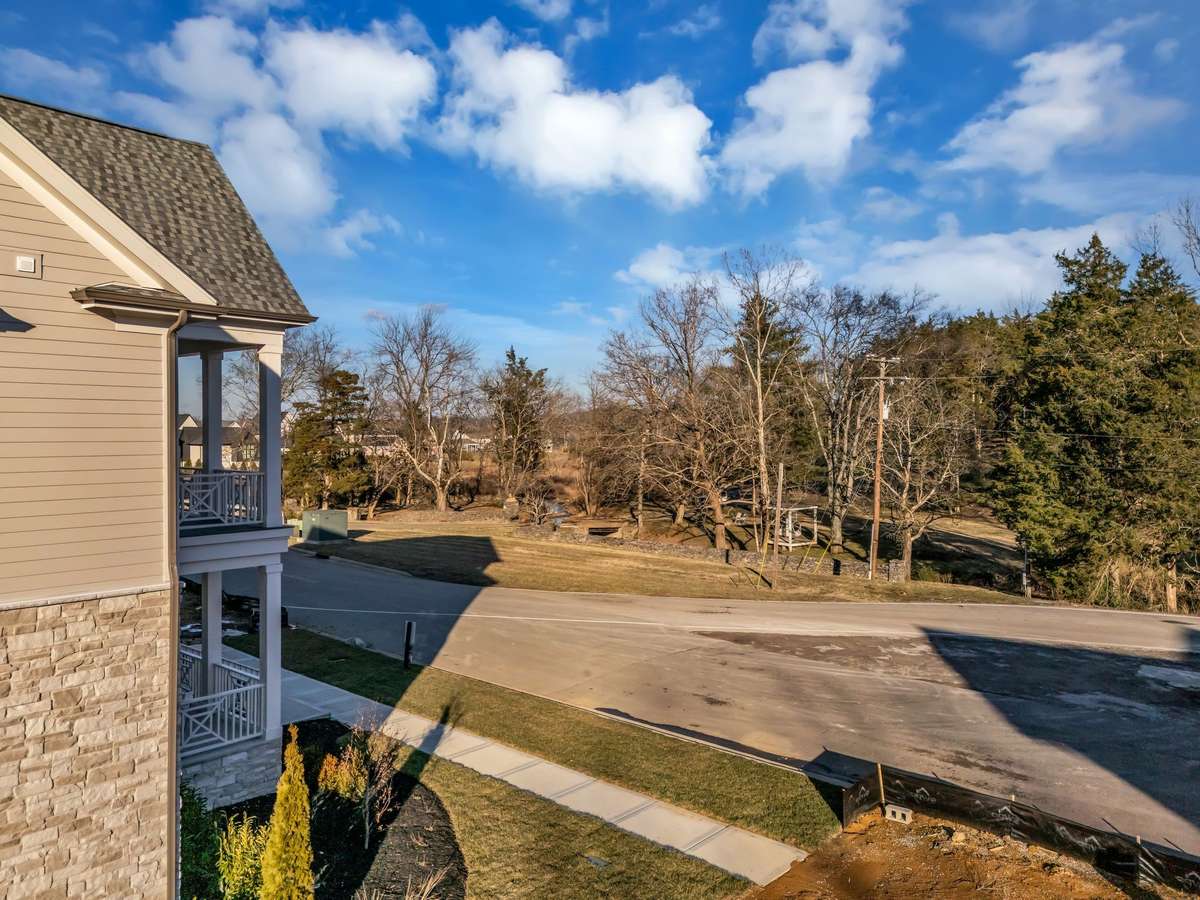 This house faces an historic old homestead that feels like a forest.  Incredible views off the 2 story front porches
