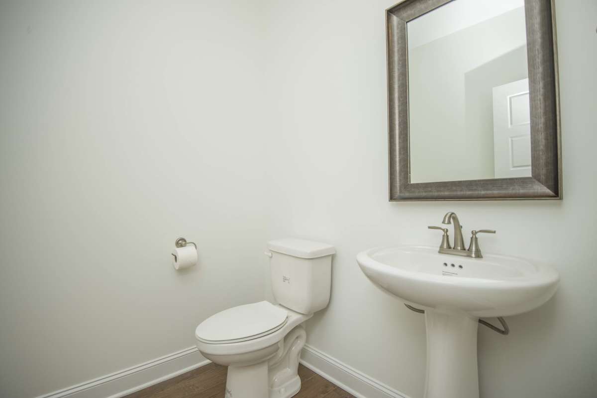 Photos displayed are of a model home. Actual options, finishes, colors, and selections may differ in the home being offered for sale.