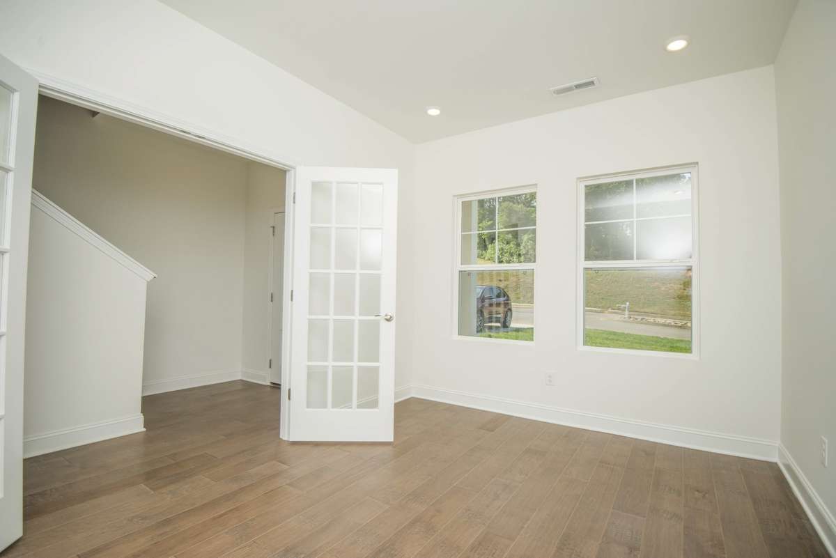 Photos displayed are of a model home. Actual options, finishes, colors, and selections may differ in the home being offered for sale.