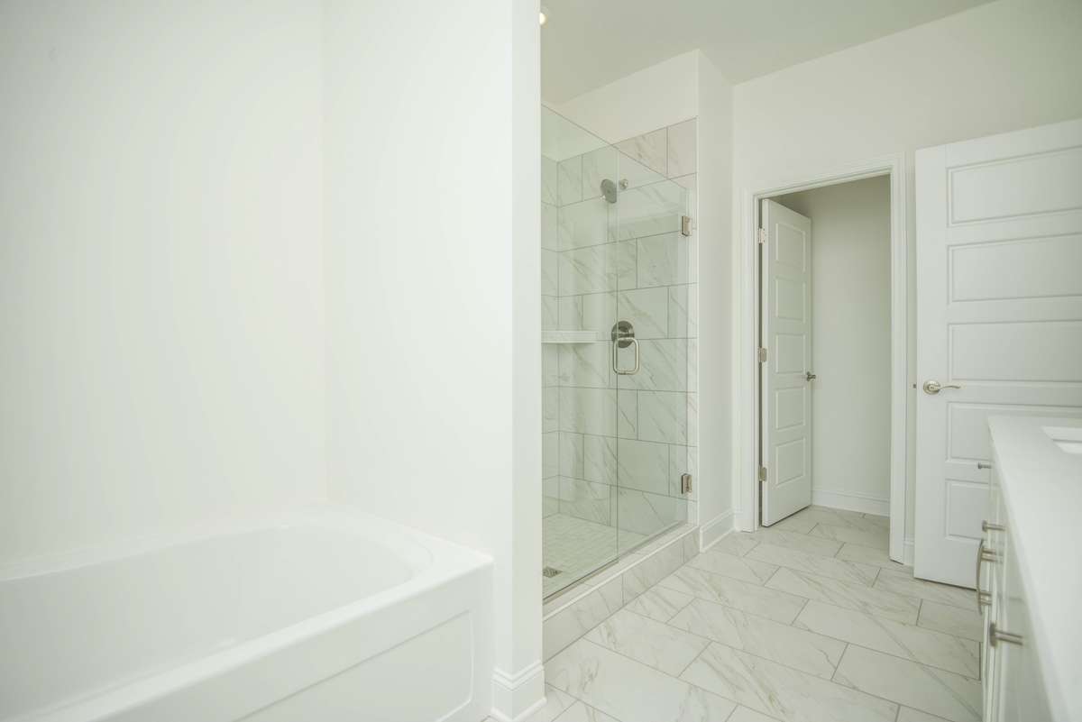 Photos displayed are of a model home. Actual options, finishes, colors, and selections may differ in the home being offered for sale.