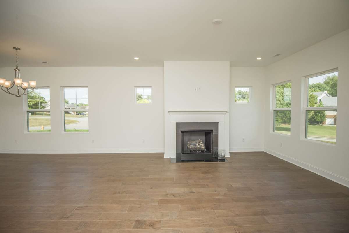 Photos displayed are of a model home. Actual options, finishes, colors, and selections may differ in the home being offered for sale.