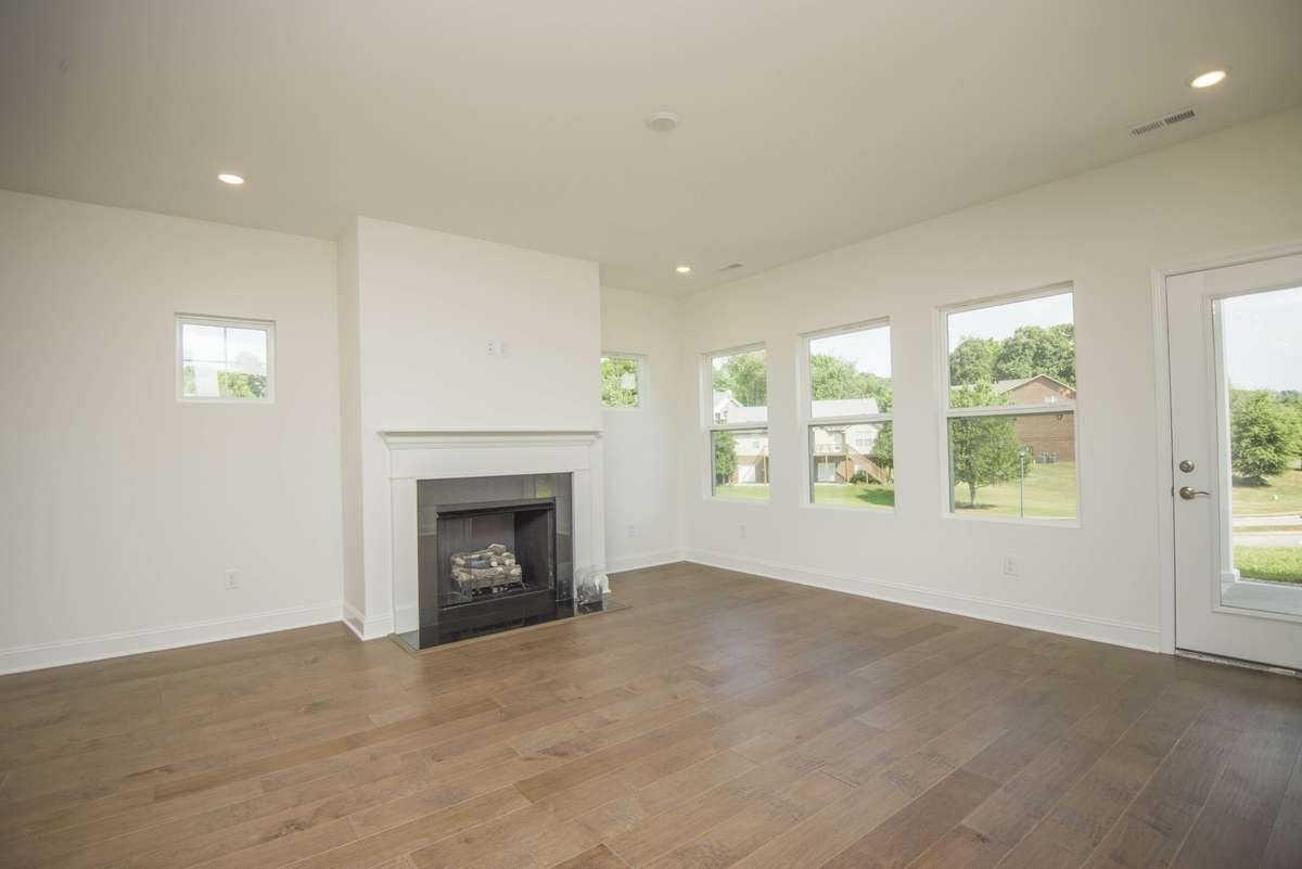 Photos displayed are of a model home. Actual options, finishes, colors, and selections may differ in the home being offered for sale.