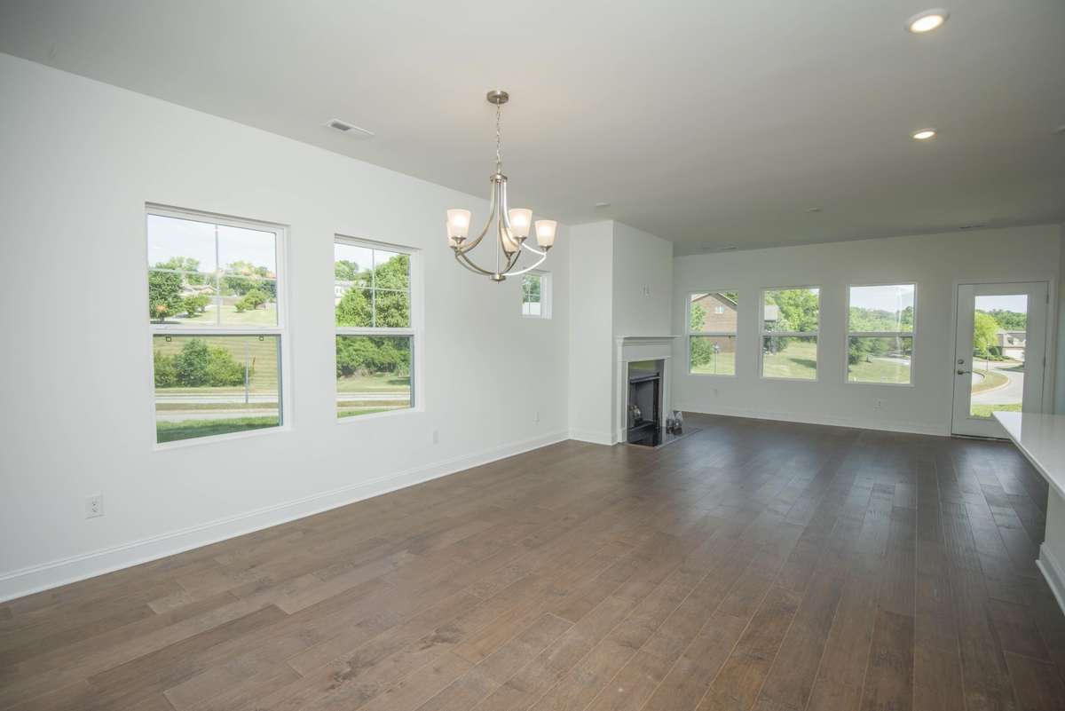 Photos displayed are of a model home. Actual options, finishes, colors, and selections may differ in the home being offered for sale.