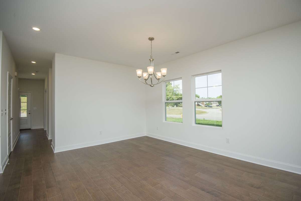 Photos displayed are of a model home. Actual options, finishes, colors, and selections may differ in the home being offered for sale.