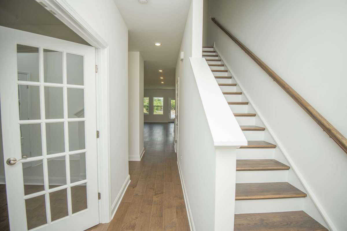 Photos displayed are of a model home. Actual options, finishes, colors, and selections may differ in the home being offered for sale.