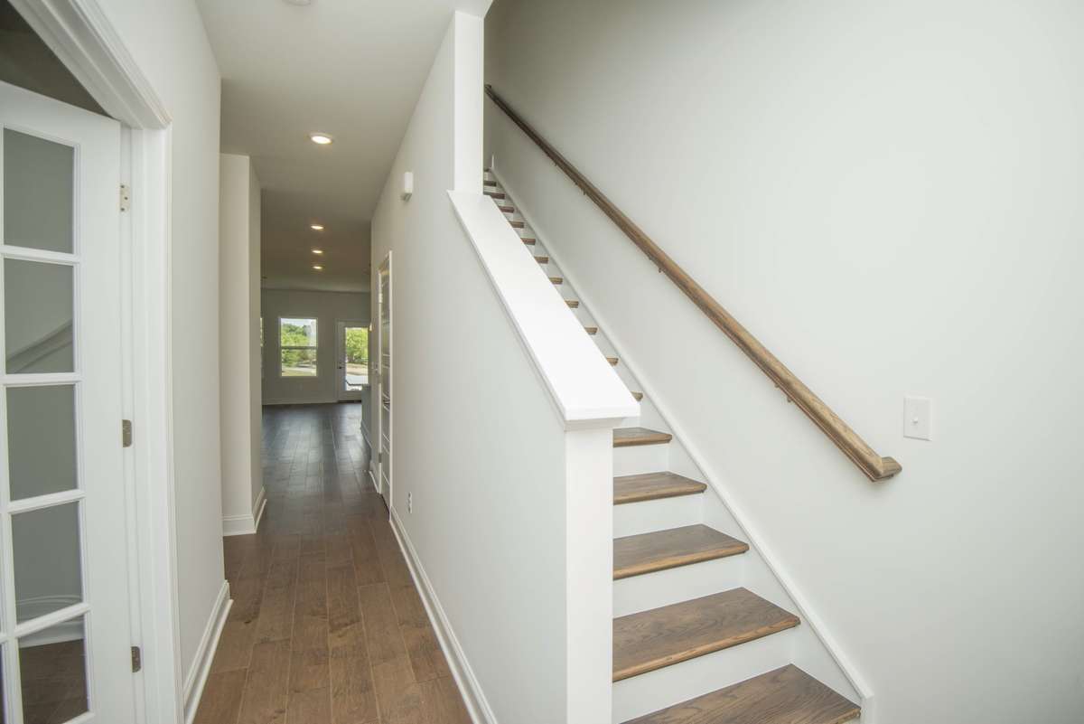 Photos displayed are of a model home. Actual options, finishes, colors, and selections may differ in the home being offered for sale.