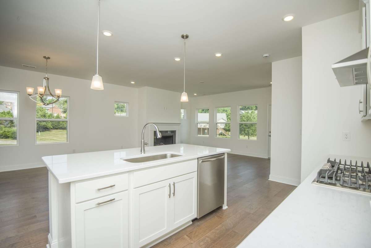 Photos displayed are of a model home. Actual options, finishes, colors, and selections may differ in the home being offered for sale.