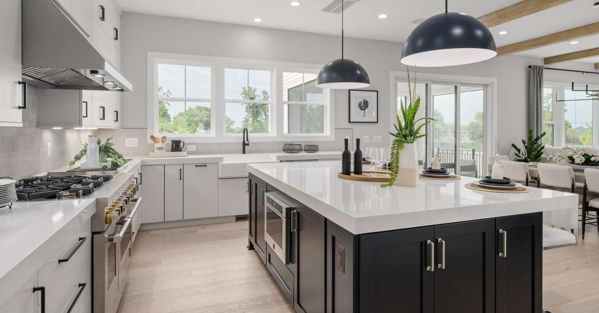 This portrays a lovely kitchen on the back side of one of Toll Brothers homes.