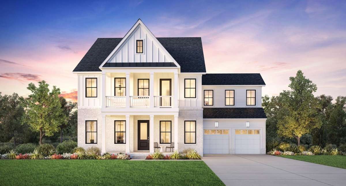 Welcome to Toll Brothers Franklin Ridge and the Monarda in the Modern Farmhouse elevation that includes a second story covered balcony.