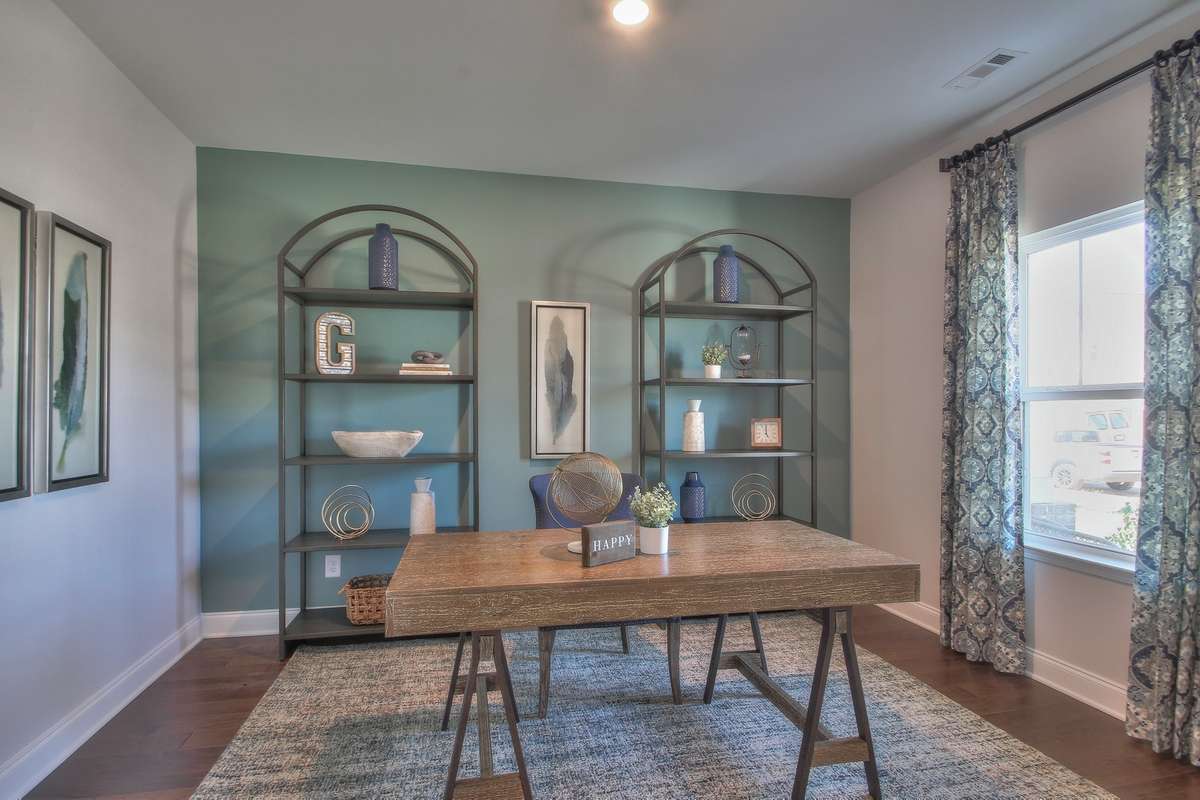 Flex room/ Bedroom 4 downstairs. Photo is of likeness taken from model home; colors and finishes will vary.