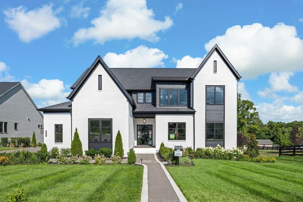 The Elmsdale - Beautifully Designed and Built by Drees Homes. Photos are of a complete home.