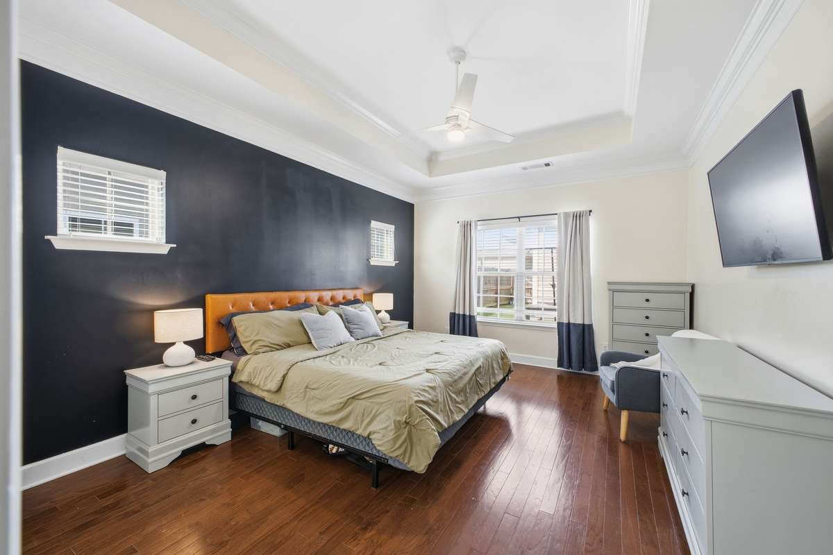 Primary suite conveniently located on the first floor, offering comfort, privacy, and easy everyday living.