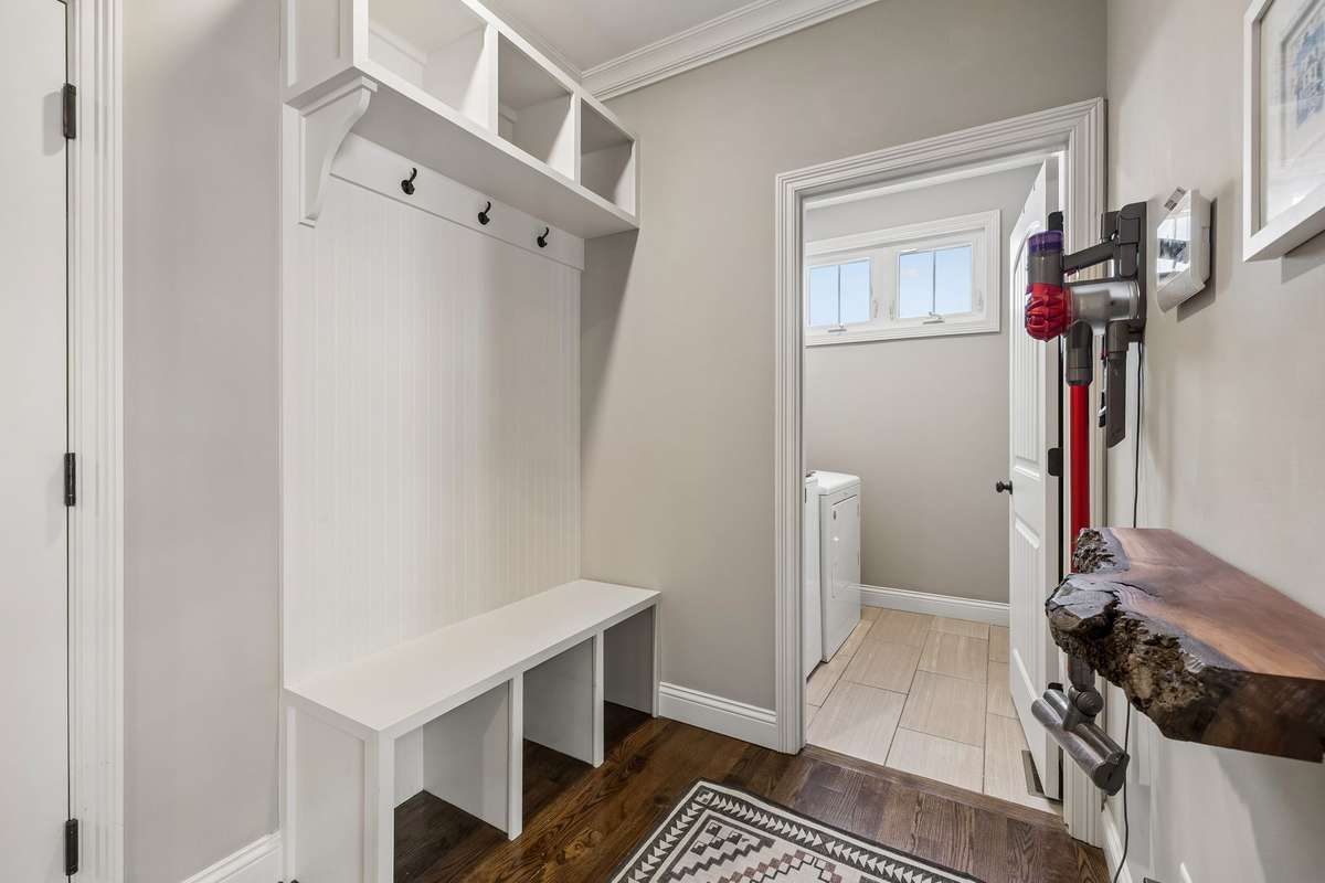 Drop zone cubby storage off of the garage entryway