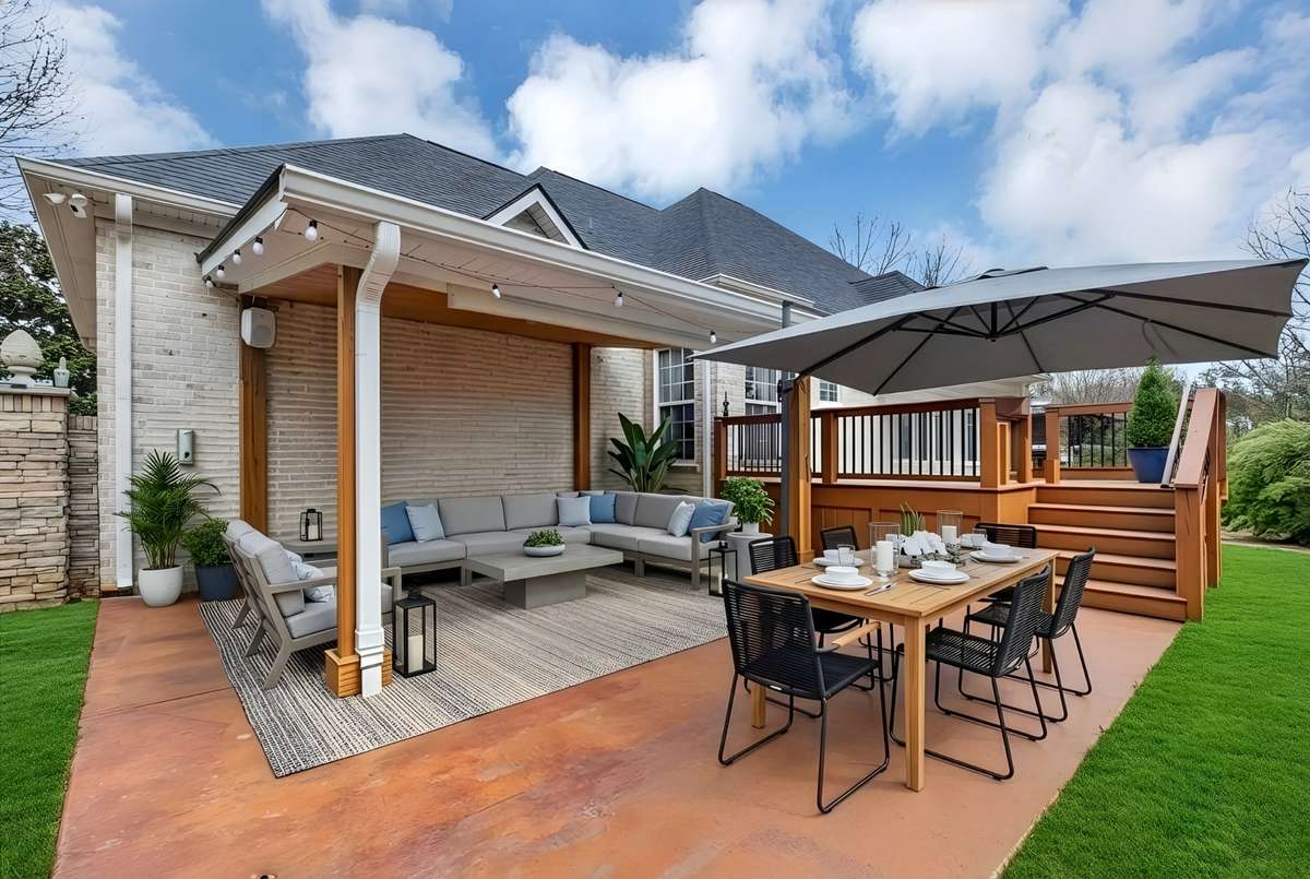 The deck drops down to the perfect patio for a BBQ with family & friends!