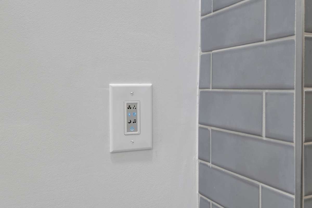 Modern shower enhancements integrate lighting, ventilation, and music!