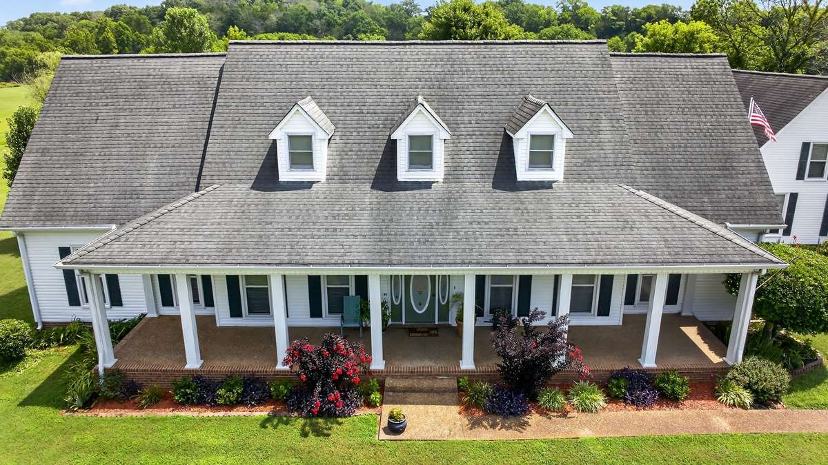 Rock on this beautiful Front Porch.