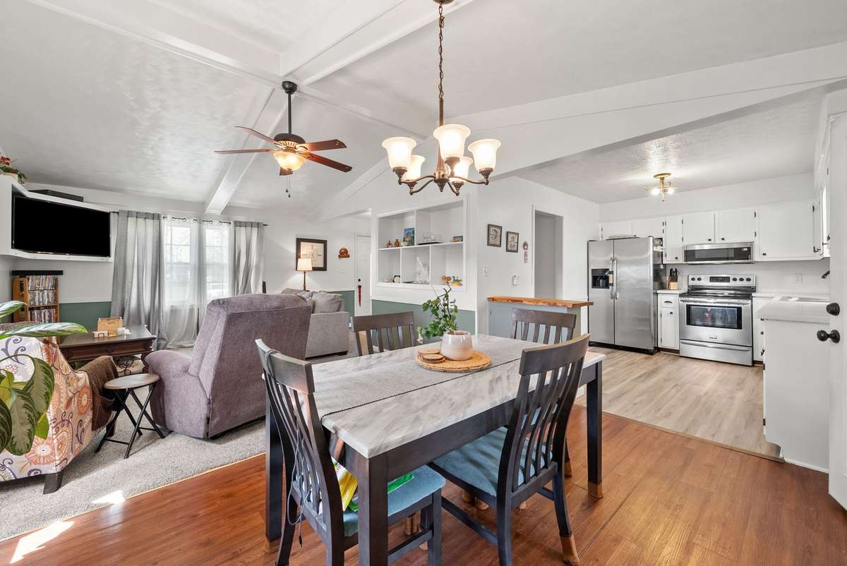 Great transition from living room, dining area and kitchen