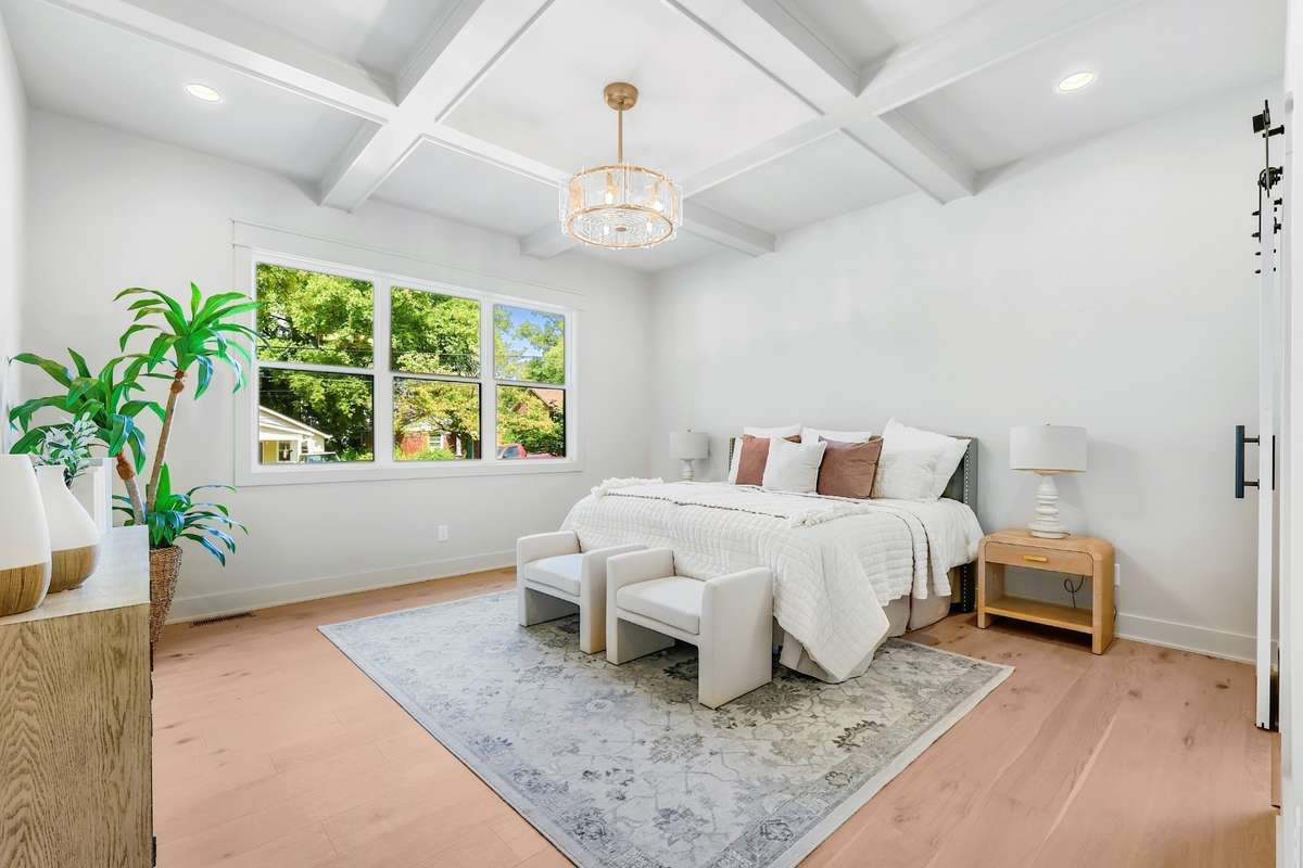 Main level primary w/ coffered ceiling