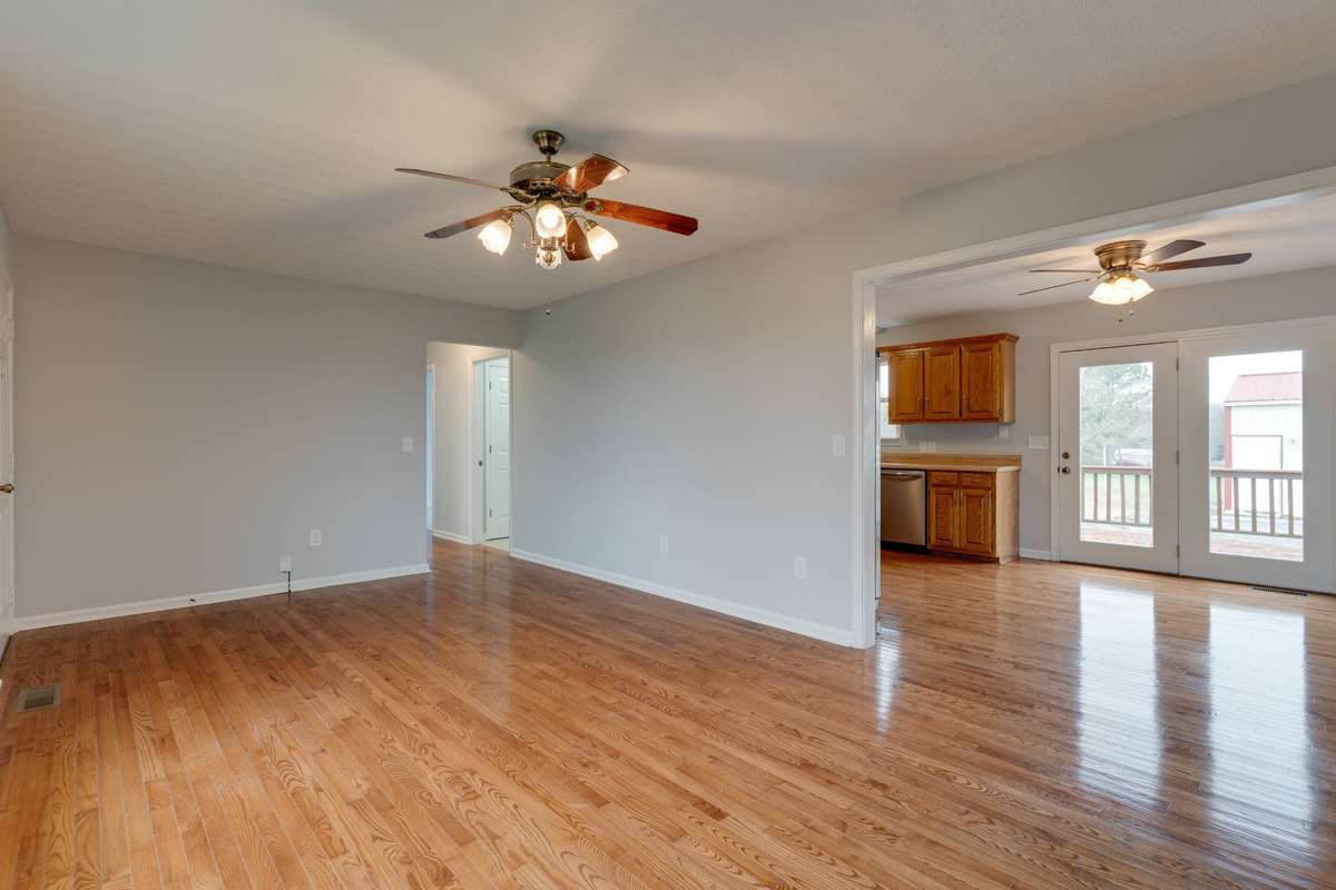 Notice the REAL GLEAMING HARDWOOD FLOORS in this home!