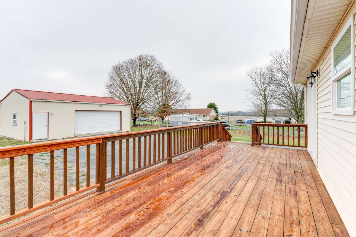 HUGE deck has been recently re-sealed and new railing added.