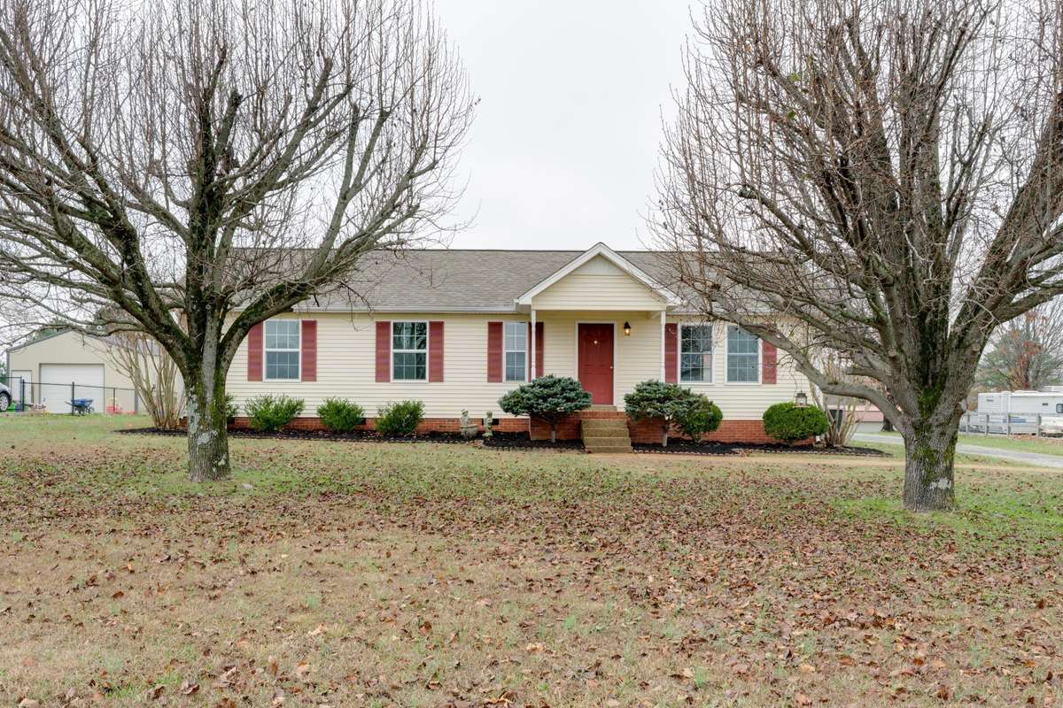 This cozy home is freshly painted throughout and sits on a huge lot with a DETACHED TWO CAR GARAGE/SHOP with electricity!
