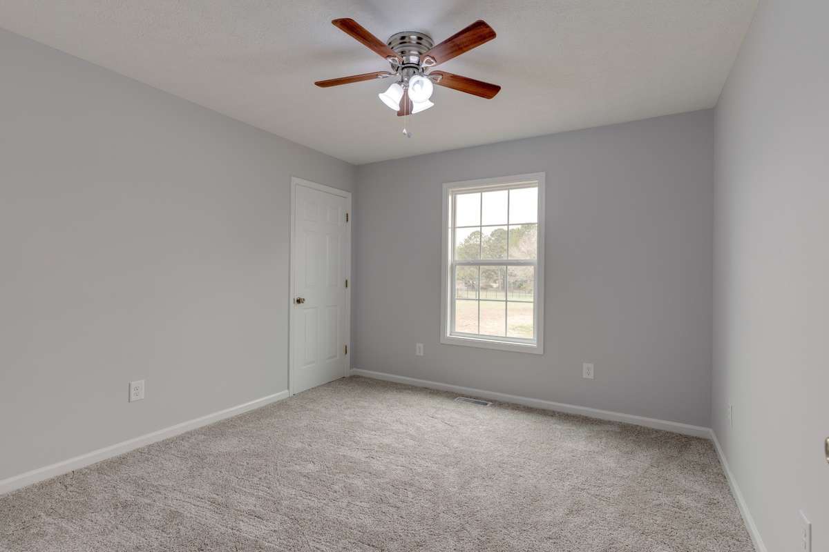 Guest room 1 - new carpet and fresh paint on walls, doors, trim and ceiling!