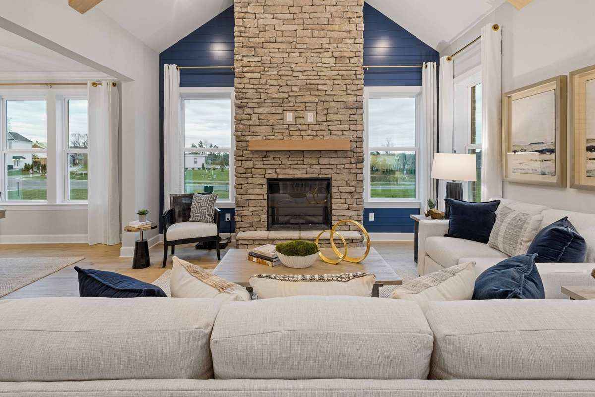 The vaulted ceiling in your great room is a show stopper! We include a fireplace in your great room to cozy up by.