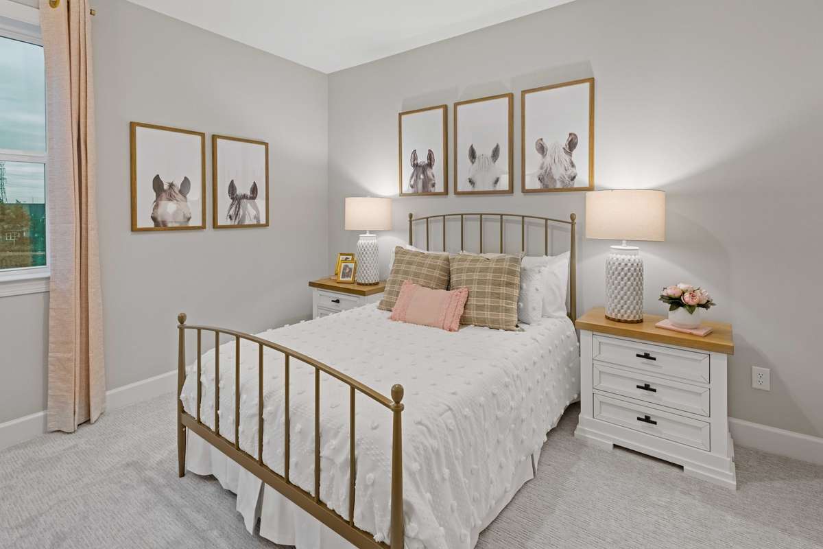 1 of 3 guest bedrooms upstairs. Great natural light and walk-in closet!