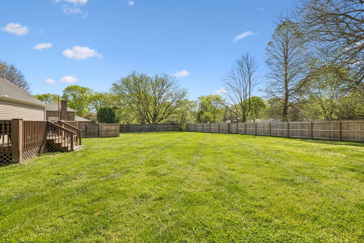 fully fenced, level backyard!