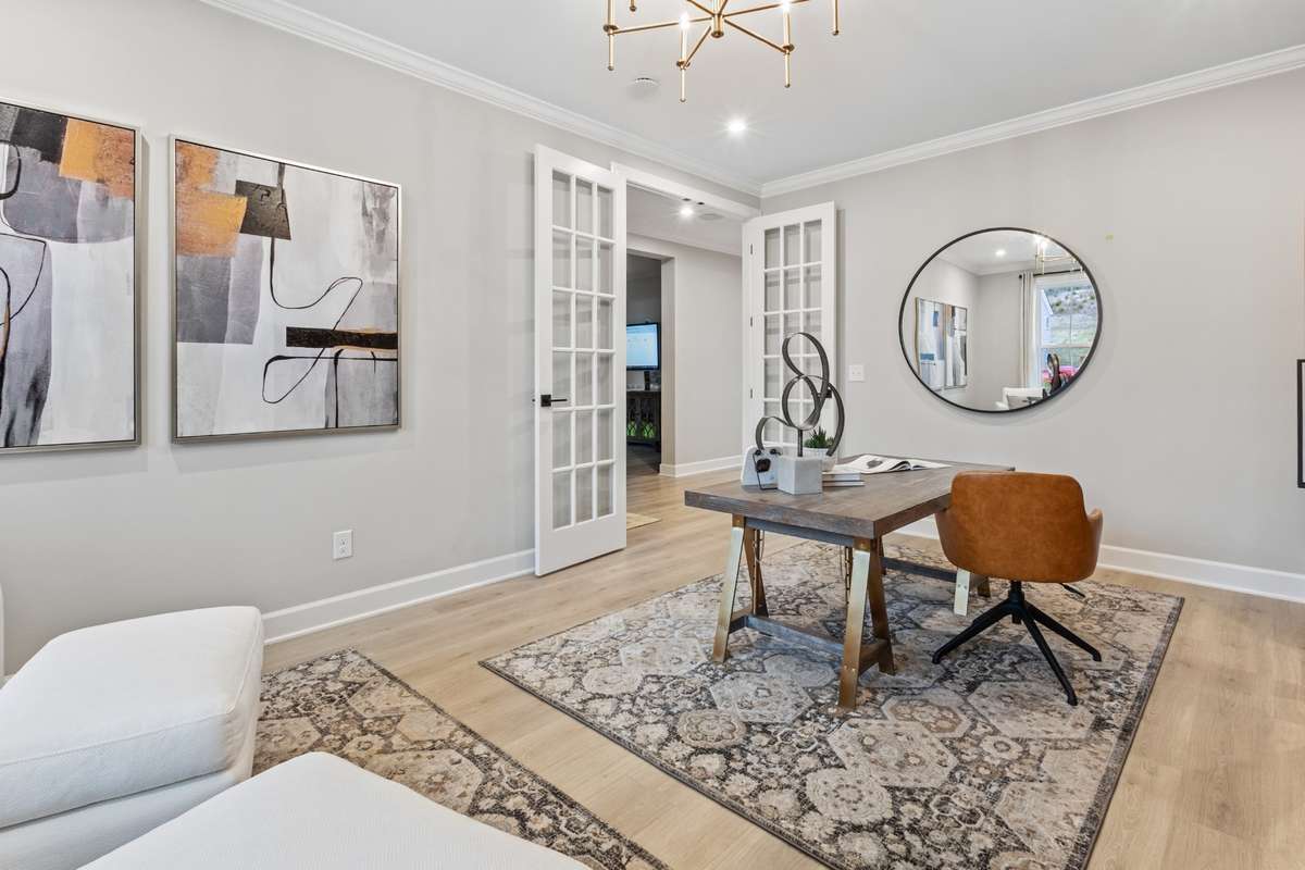 5 bedroom/4 bathroom home with 2 bedrooms on main level, including your primary bedroom! *Study shown here, but we converted this front area to a bedroom with a full bath.*