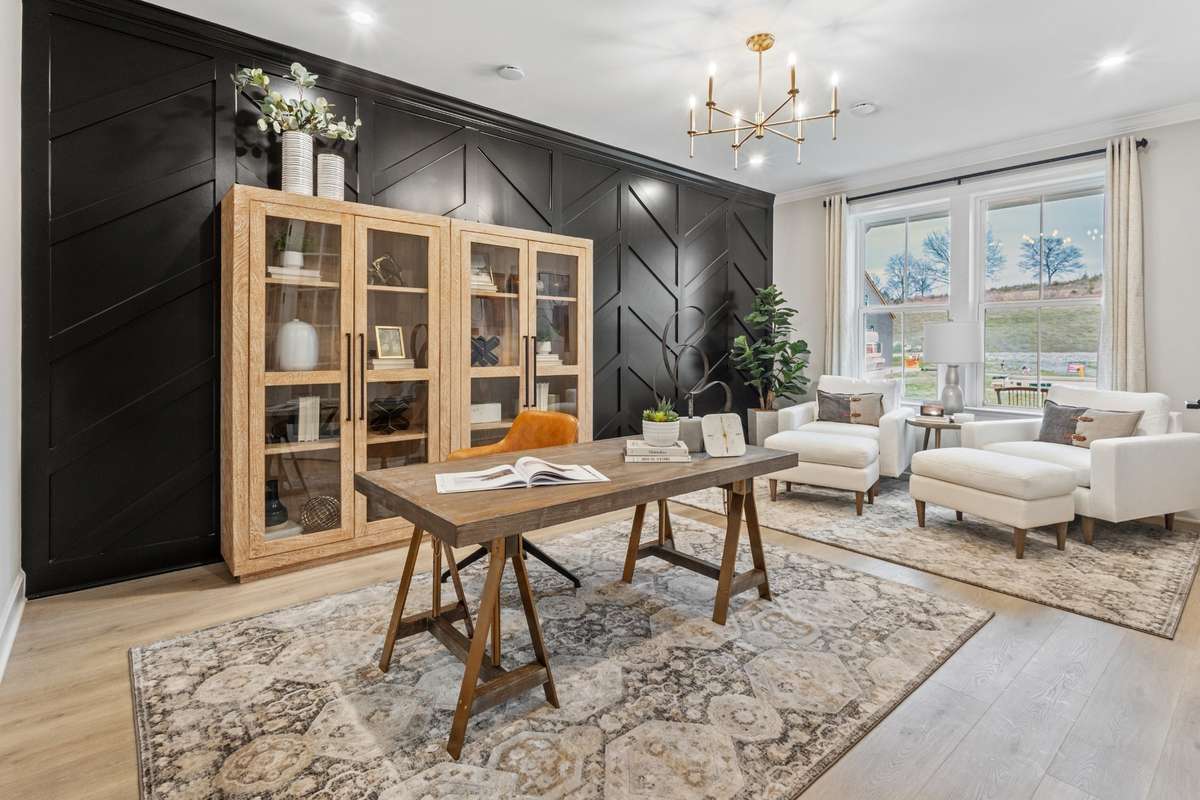 5 bedroom/4 bathroom home with 2 bedrooms on main level, including your primary bedroom! *Study shown here, but we converted this front area to a bedroom with a full bath.*