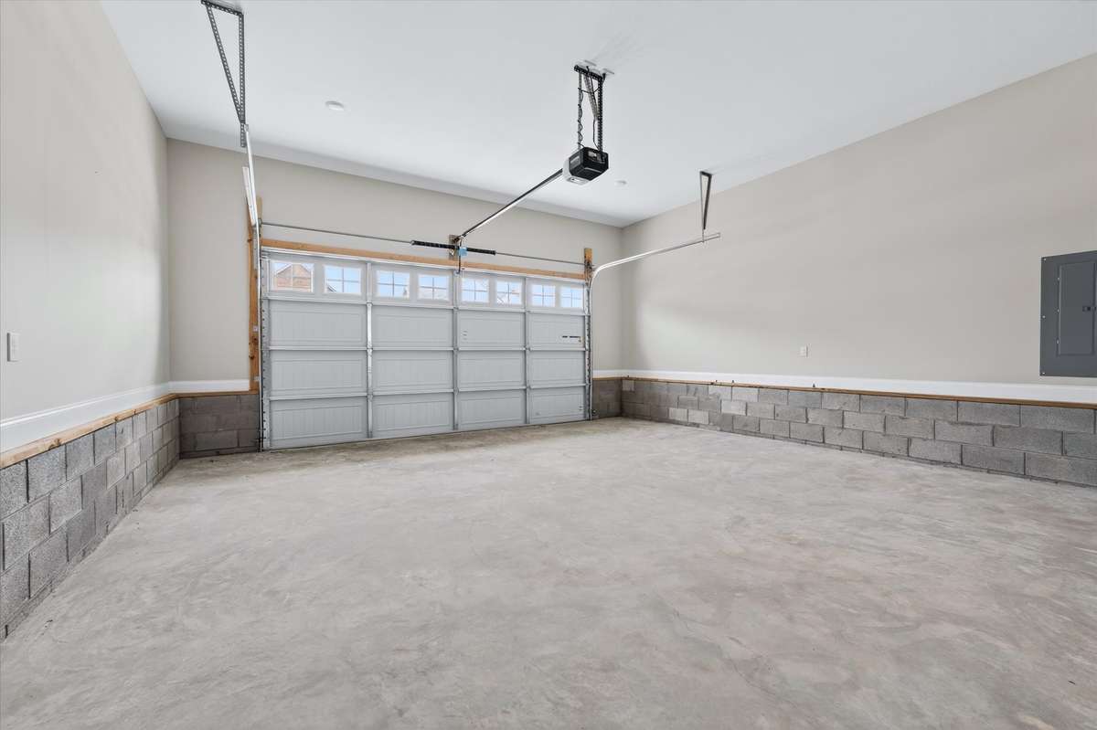 Spacious two-car garage with additional storage area