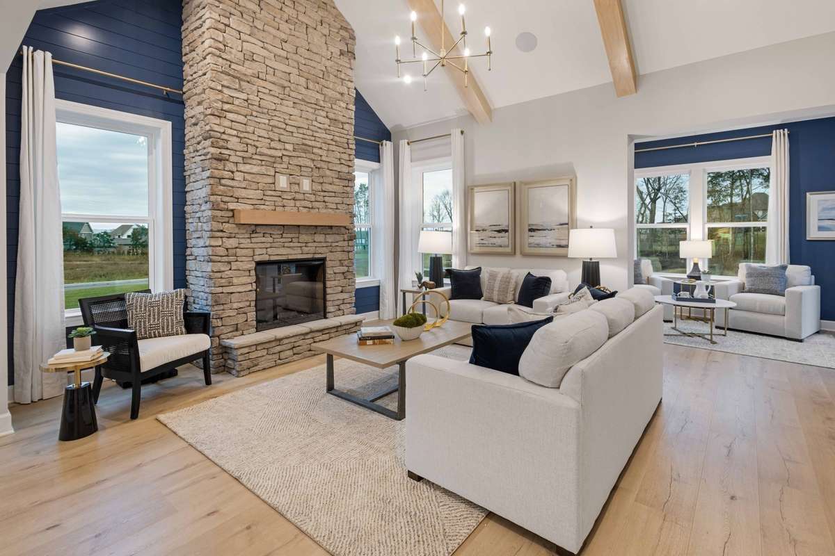 The vaulted ceiling in your great room is a show stopper! We include a fireplace in your great room to cozy up by.