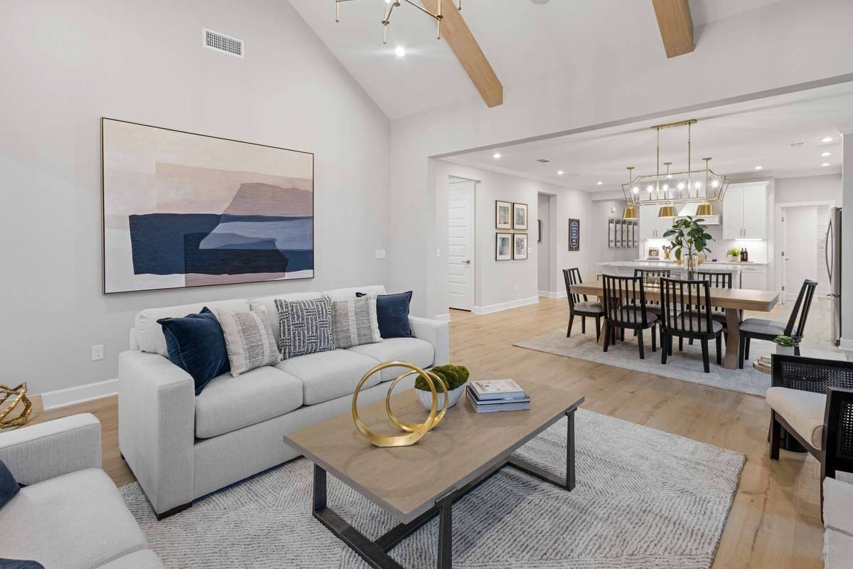 The vaulted ceiling in your great room is a show stopper! We include a fireplace in your great room to cozy up by.