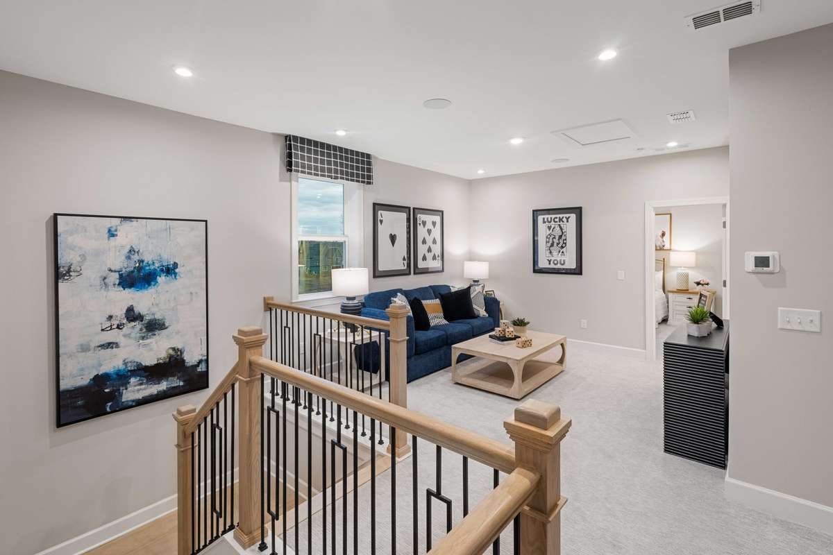 Upstairs is home to a loft, 3 bedrooms and 2 full baths. One bedroom is a suite style with a full bathroom inside of it.