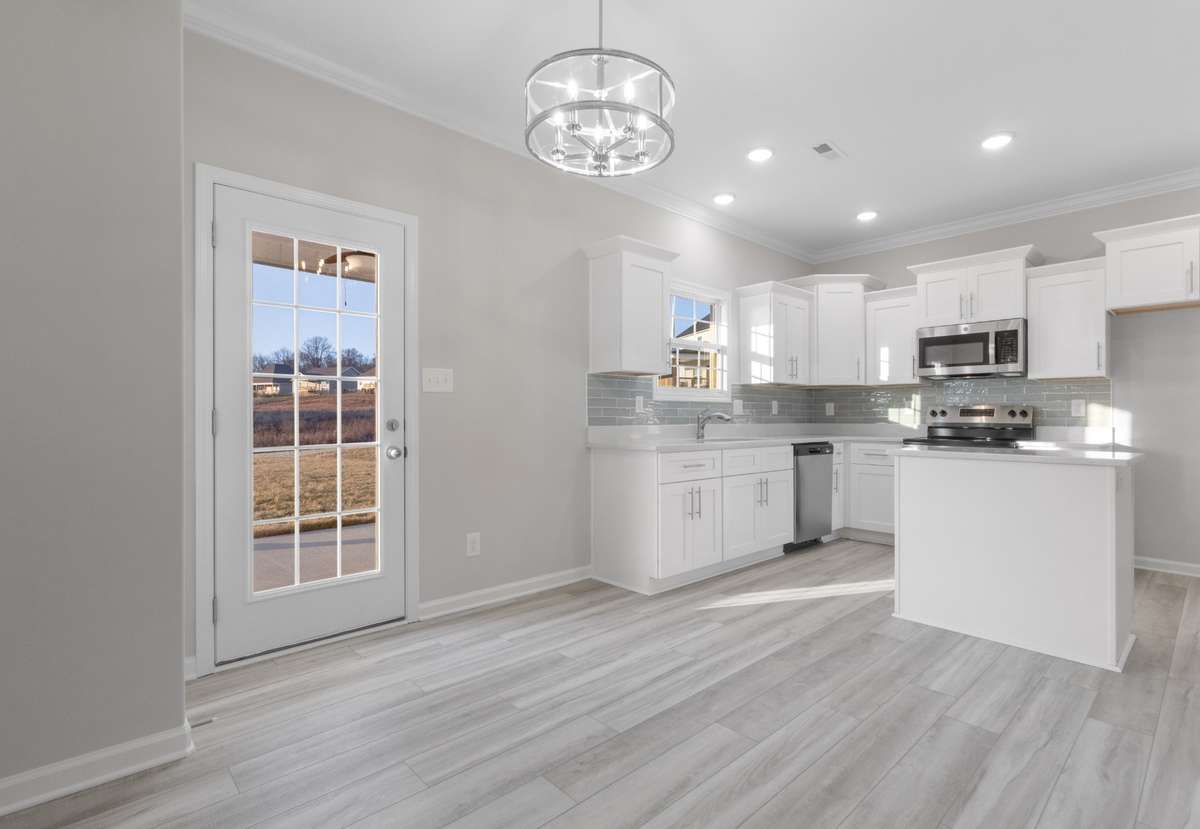 SAMPLE PHOTOS OF HOME PLAN. Interior and exterior finishes, colors, design details and upgrades may vary.