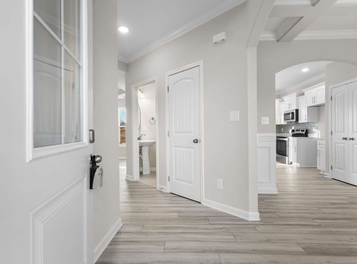 SAMPLE PHOTOS OF HOME PLAN. Interior and exterior finishes, colors, design details and upgrades may vary.