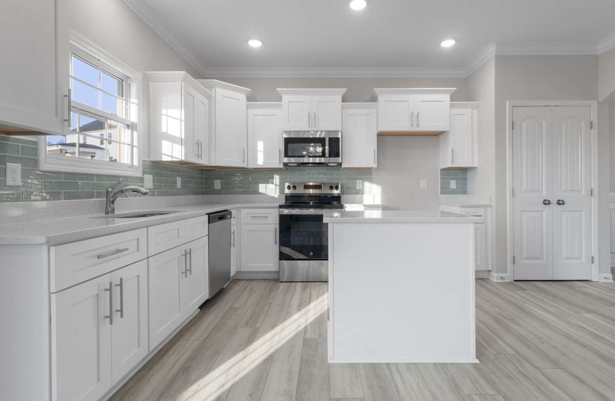 SAMPLE PHOTOS OF HOME PLAN. Interior and exterior finishes, colors, design details and upgrades may vary.