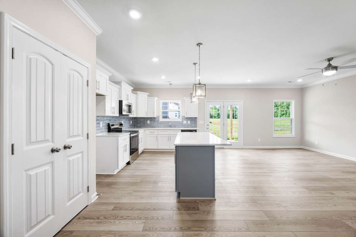 SAMPLE PHOTOS OF HOME PLAN. Interior and exterior finishes, colors, design details and upgrades may vary.