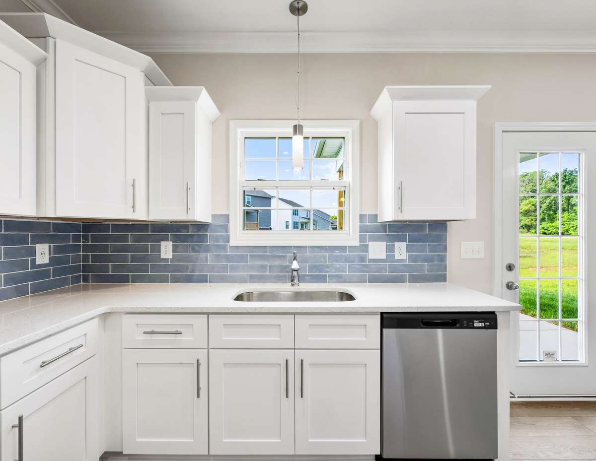 SAMPLE PHOTOS OF HOME PLAN. Interior and exterior finishes, colors, design details and upgrades may vary.
