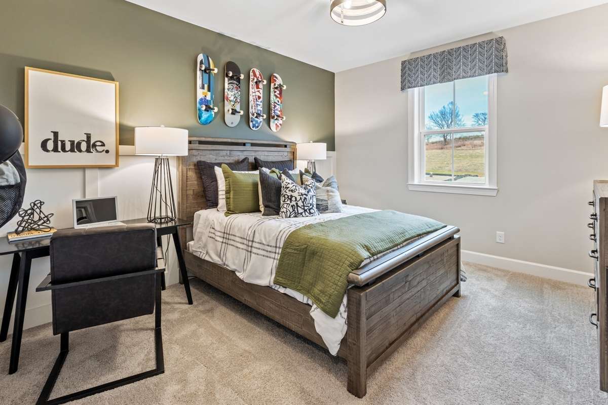 1 of 3 secondary bedrooms upstairs with walk-in closet.