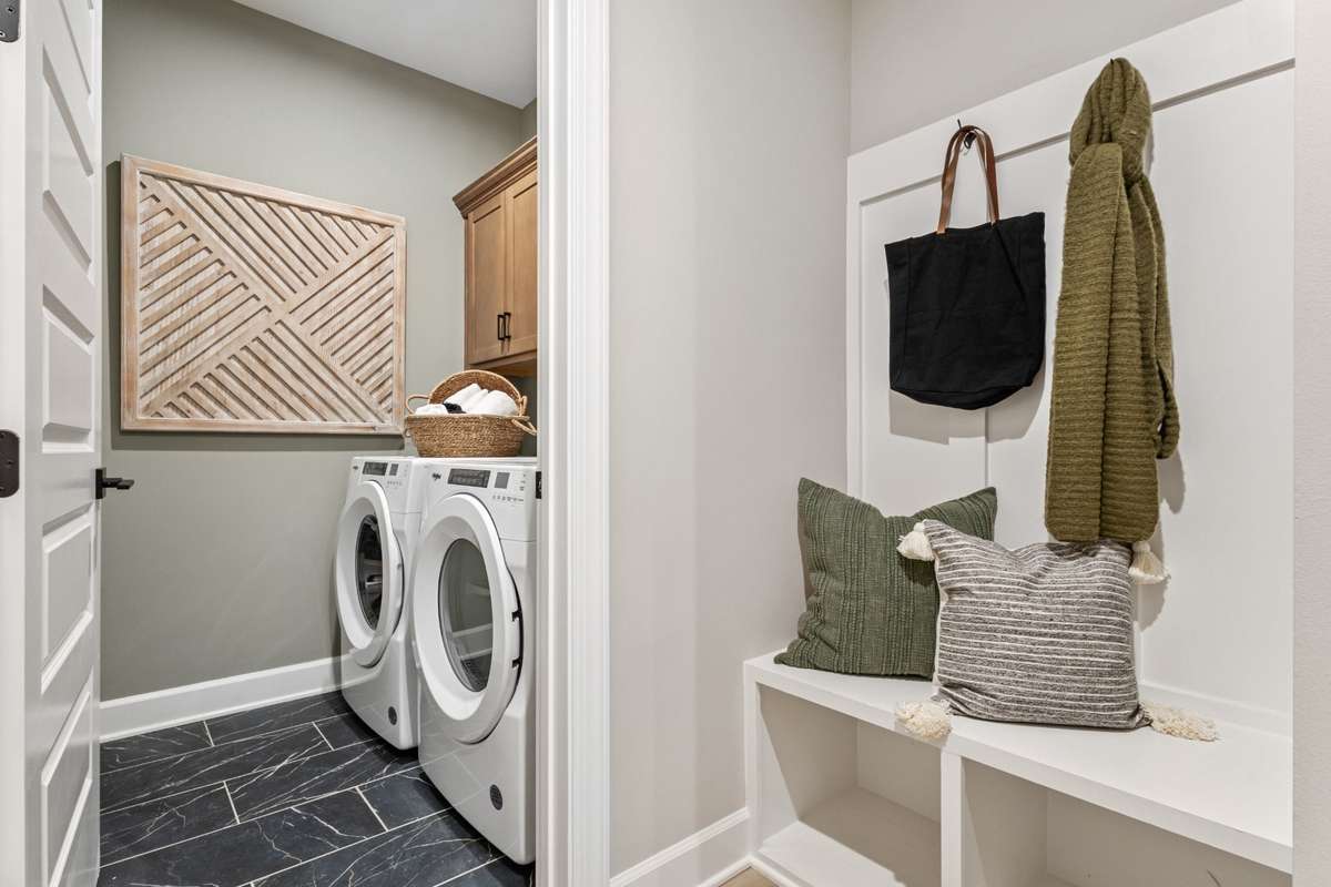 Mudroom and laundry off of the garage entry to keep life organized!