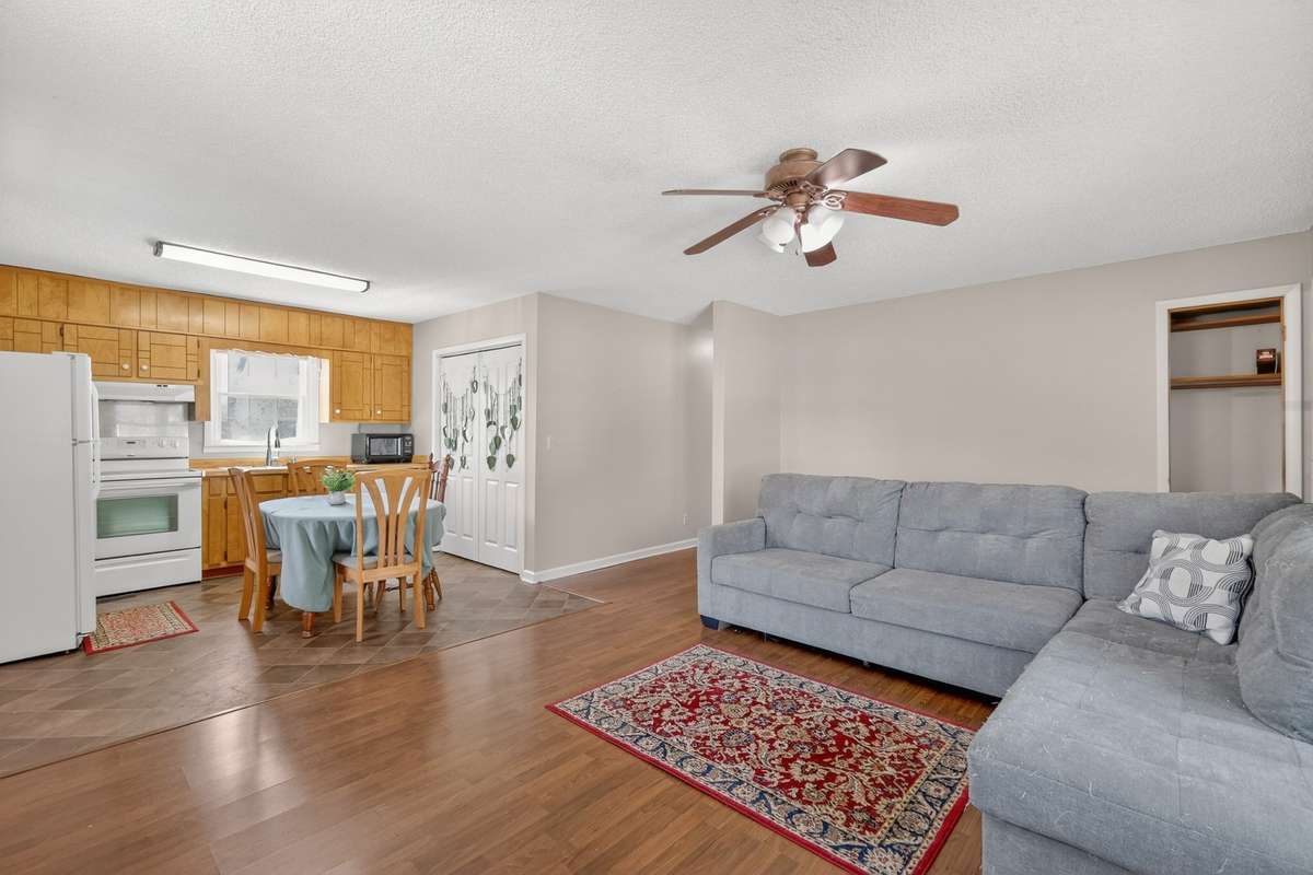 Looking to the hallway leading to bath and two bedrooms