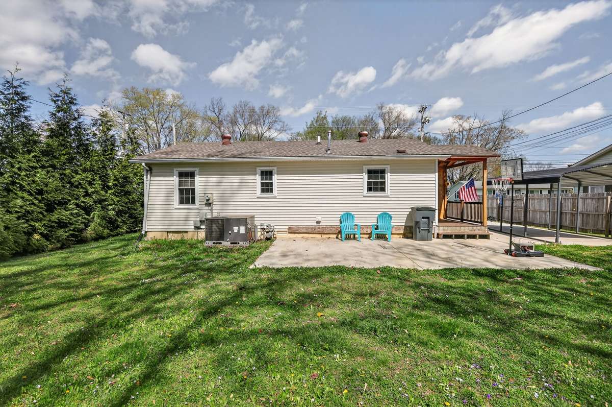 Back of the house has large concrete Patio