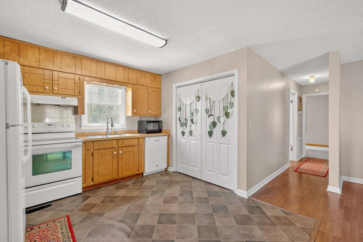 As you enter the side door of home you step into the kitchen